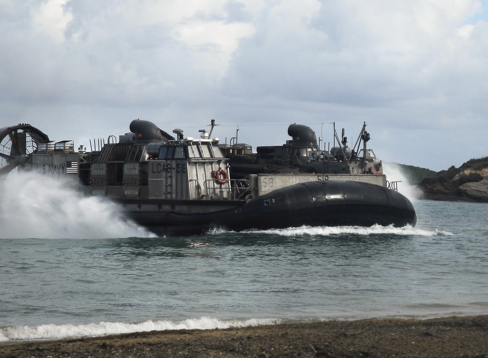 USS Harpers Ferry offloads Marines, takes on supplies