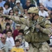 A Navy SEAL points to members of the crowd during a capabilities demonstration as part of the 2009 Veterans Day Ceremony and Muster XXIV at the National Navy UDT-SEAL Museum in Fort Pierce, Fla. The annual muster is held at the museum, which is located on