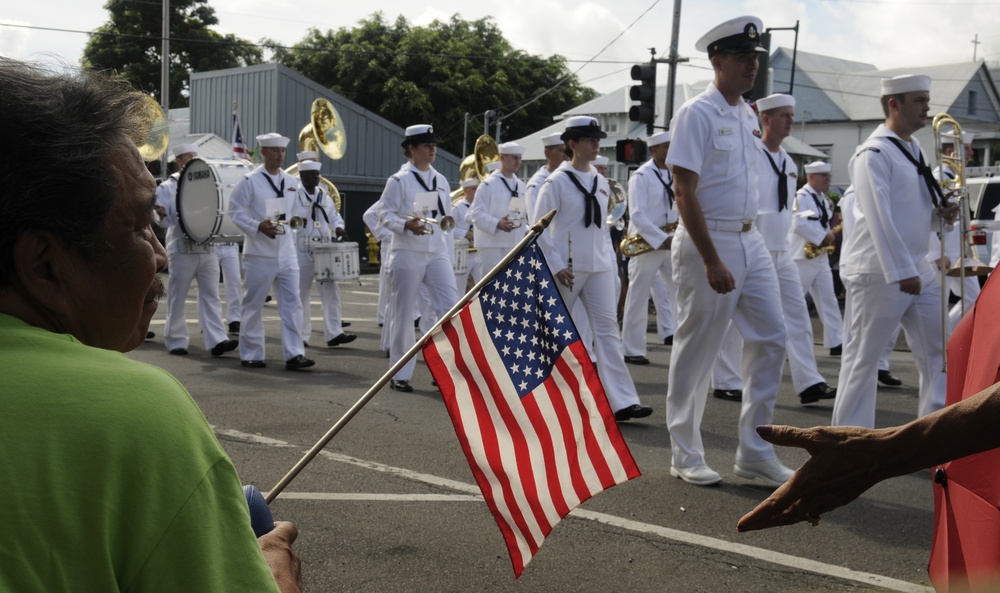 Sailors assigned to the U.S. Pacific Fleet Band march in a Veterans Day parade. More than 50 active, reserve and retired military units participated in the celebration.