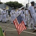 Sailors assigned to the U.S. Pacific Fleet Band march in a Veterans Day parade. More than 50 active, reserve and retired military units participated in the celebration.
