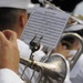 Sailors assigned to the U.S. Pacific Fleet Band march in a Veterans Day parade. More than 50 active, reserve and retired military units participated in the celebration.