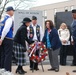 Allyn B. Donath and Sarah Baxter lay the wreath honoring all submariners who have been lost in service to their country in front of the Wall of Honor at the U.S. Submarine Veterans WWII National Submarine Memorial East in Groton. The submarine veterans' V