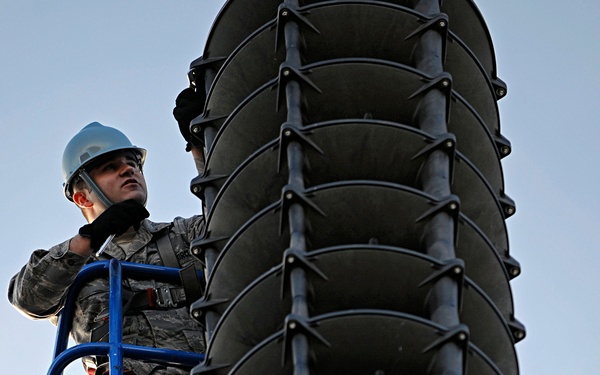 Ellsworth Airmen repair speakers
