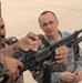 U.S. Airmen Unload Ammunition Skills on Iraqis