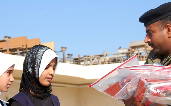 Cavalry troopers, Iraqi army visit local school; provide assistance
