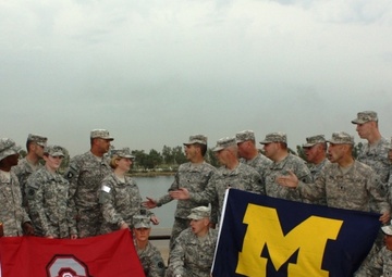 College football rivals meet in Iraq