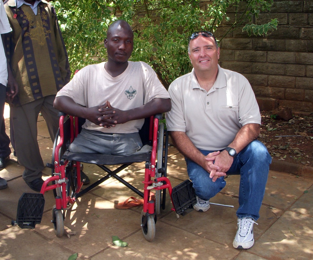Africans Join CJTF-HOA Chaplain to Help Disabled Man