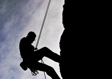 Trooper Seeks Thrills on Cliff Face