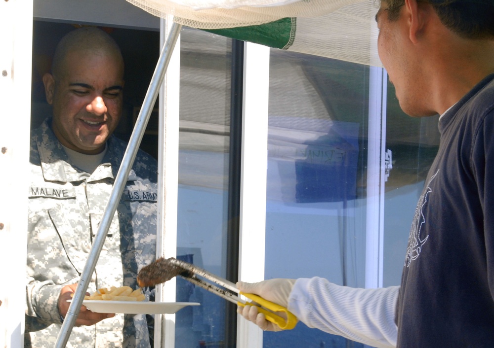 Service members are recognized on Veterans Day with a special meal at the Seaside Galley at Joint Task Force Guantanamo, Nov. 11. The galley served fare such as teriyaki steak fresh from the grill, traditional sheet cake and many other delectable treats a