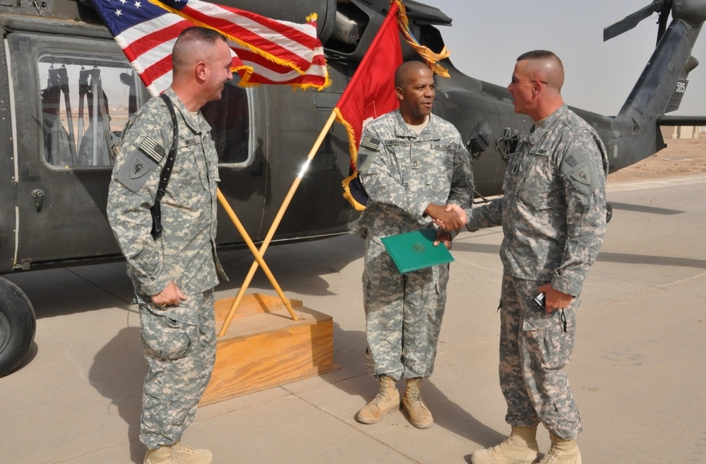 Soldiers continue long, winding road, re-enlist while in Iraq