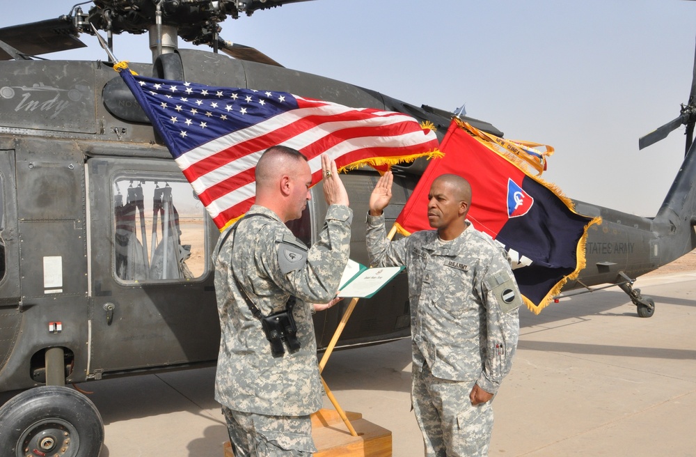 Soldiers continue long, winding road, re-enlist while in Iraq