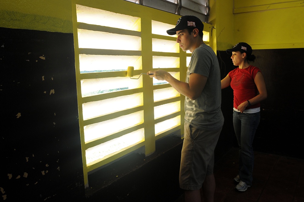 Security Cooperation Marine Air-Ground Task Force Marines and Wasp Sailors paint school in Jamaica