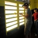 Security Cooperation Marine Air-Ground Task Force Marines and Wasp Sailors paint school in Jamaica