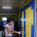 Security Cooperation Marine Air-Ground Task Force Marines and Wasp Sailors paint school in Jamaica
