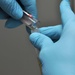 USS Nimitz hospital corpsman analyzes blood sample
