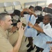 Sailors and Marines Give to Jamaican School and Hospital