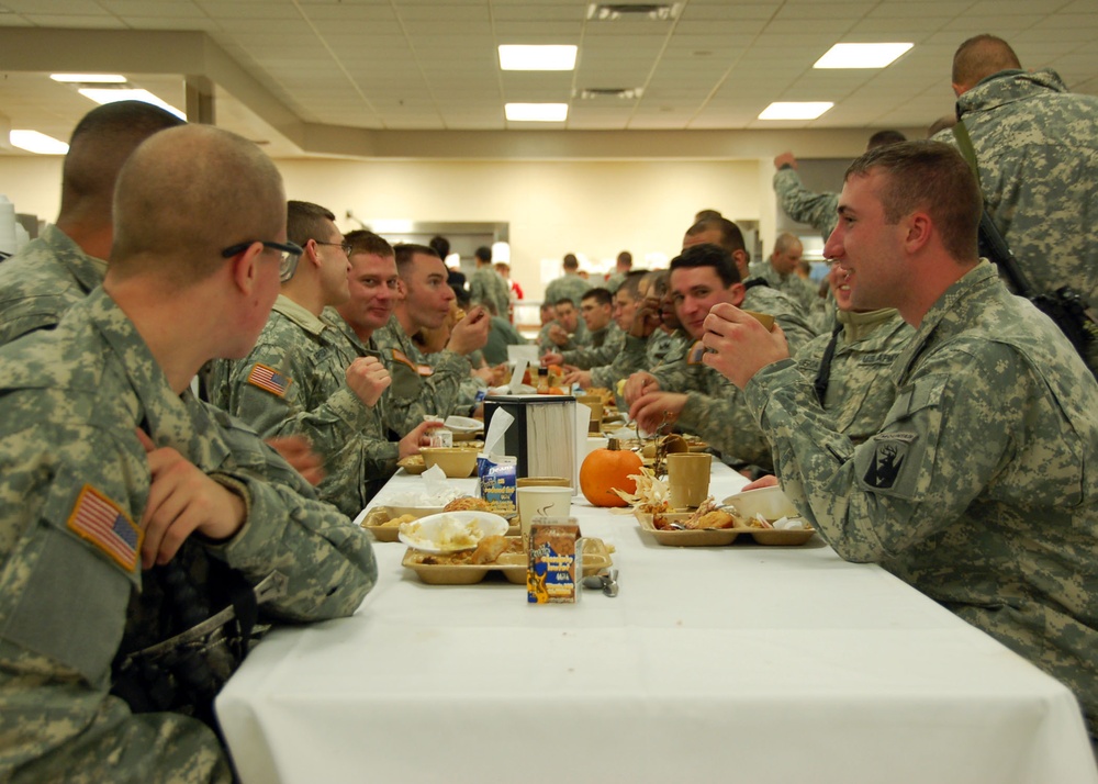 Soldiers enjoy a Chow Hall Thanksgiving dinner