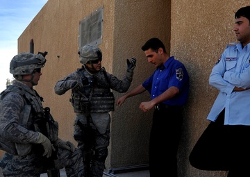 Security Forces Airmen mentor Iraqi police officers