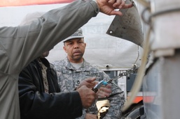 Security forces along Iraq, Turkey border inspect trucks