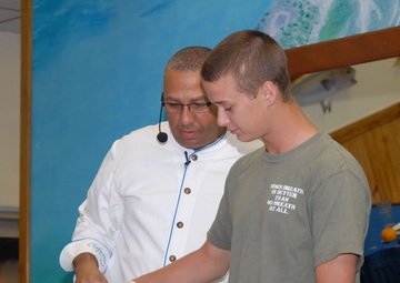Guest Chef Andre Halson Prepares a Pecan Butterscotch During a Food Demonstration at Naval Station Guantanamo Bay