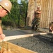 Seabees construct a tool shed at Feed My Sheep soup kitchen