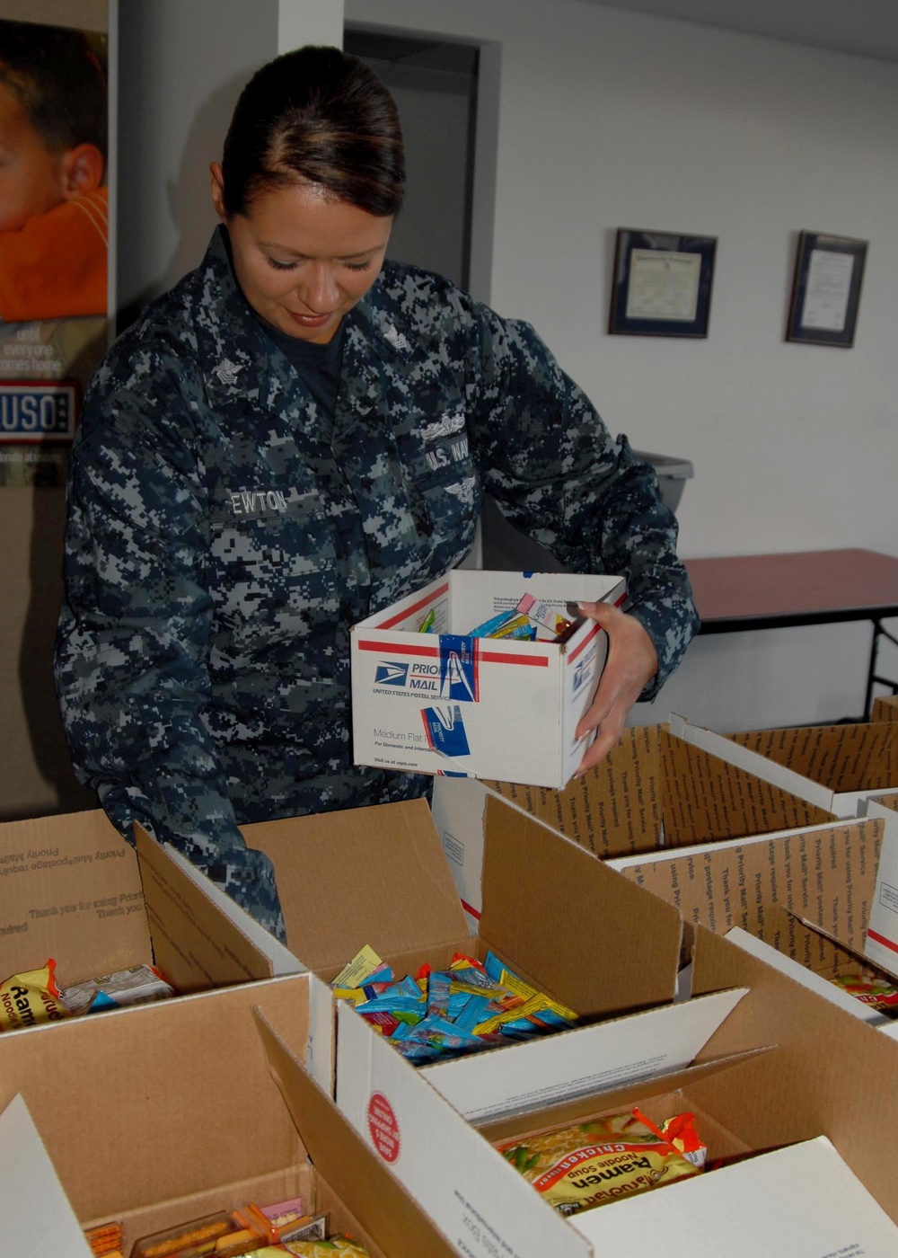 Sailors work with Adopt-a-Soldier