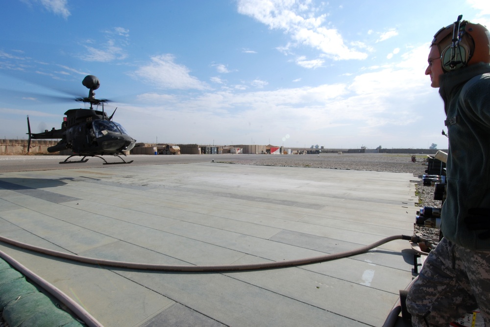 Refueling an OH-58 Kiowa Warrior