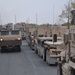 Soldiers convoy building materials, support forward operating base expansion