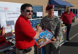 Volunteers Give Time, Toys for Bragg Families