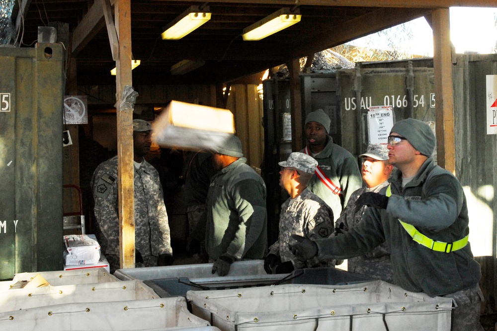 Volunteers Spread Holiday Cheer, One Parcel at a Time