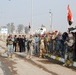Iraqi police march for review