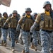 Iraqi police march for review