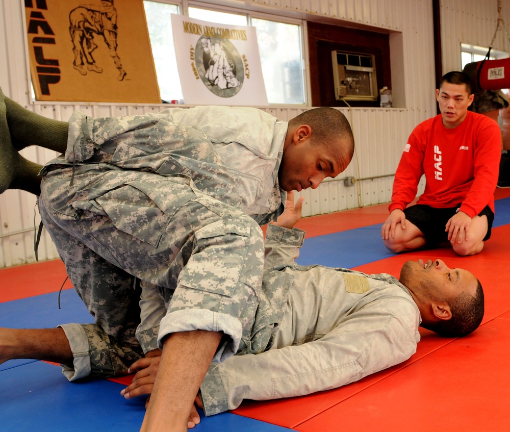 Soldiers Review Level II Combative Position During Class