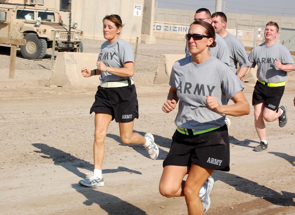 Female Soldiers max fitness test; motivate others