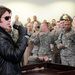 Cyrus, Kournikova visit troops