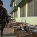 U.S., Iraqi forces deliver school supplies