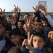 U.S., Iraqi forces deliver school supplies