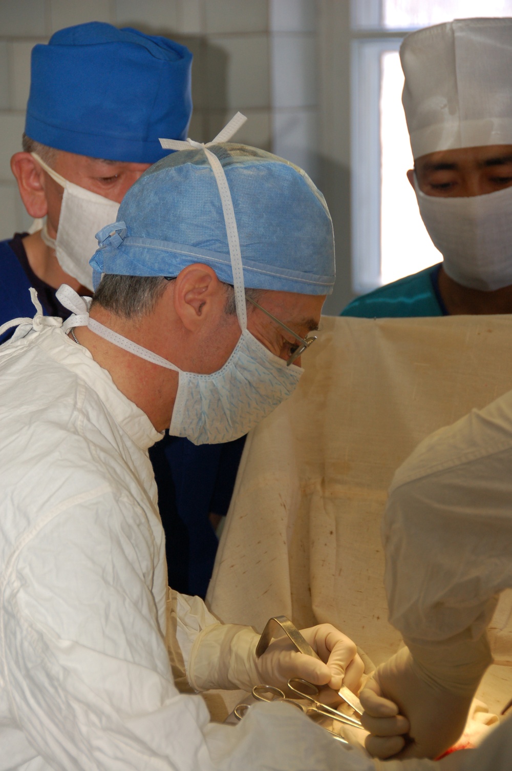 Airmen Perform Operations With Kyrgyz Surgeons