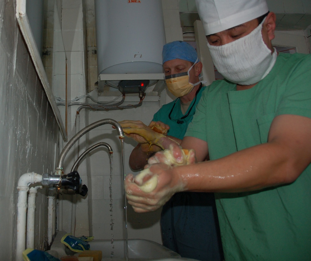 Airmen Perform Operations With Kyrgyz Surgeons
