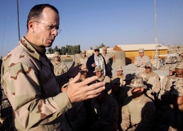 Adm. Mullen tours Afghanistan market alongside Marines, views progress
