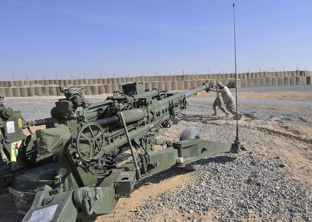 FOB Ramrod troops emplace and fire M-777 105 mm howitzer