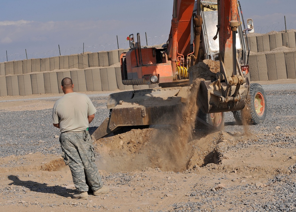 FOB Ramrod troops emplace and fire M-777 105 mm howitzer