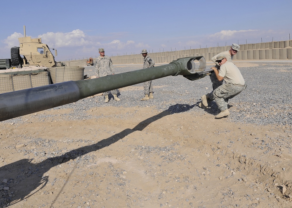 FOB Ramrod troops emplace and fire M-777 105 mm howitzer