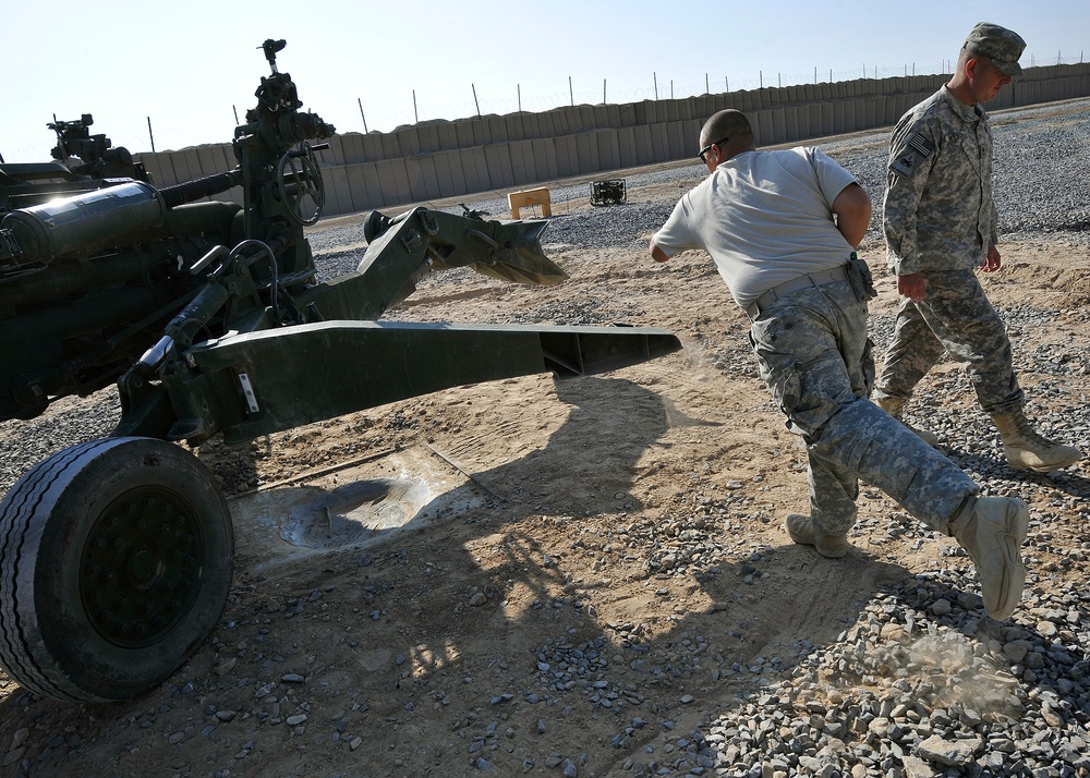 FOB Ramrod troops emplace and fire M-777 105 mm howitzer