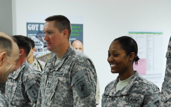 NCO's hard work rewarded with coin from MNC-I Commander