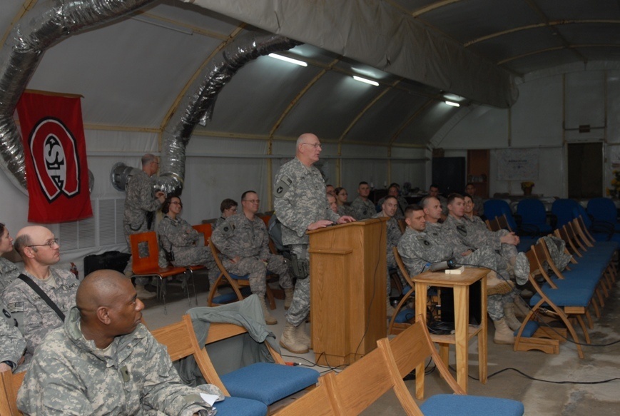 Brig. Gen Gerald Lang, deputy commander-maneuver, 34th Infantry Division, opens the Soldier assistance video teleconference at Contingency Operating Base Basra with a few words of gratitude to the people who made it possible, Dec. 17. In conjunction with