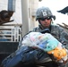 Gift giving goes well as Soldiers make time for 'Tots'