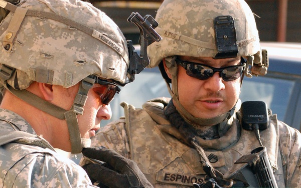 Cavalry troops search for caches in Taji