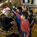 Sailors play music for children