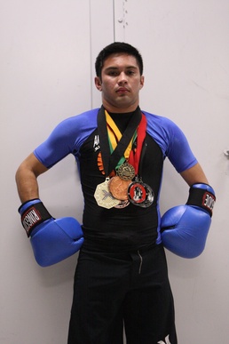 Marine's Son Overcomes Odds In, Out of the Ring